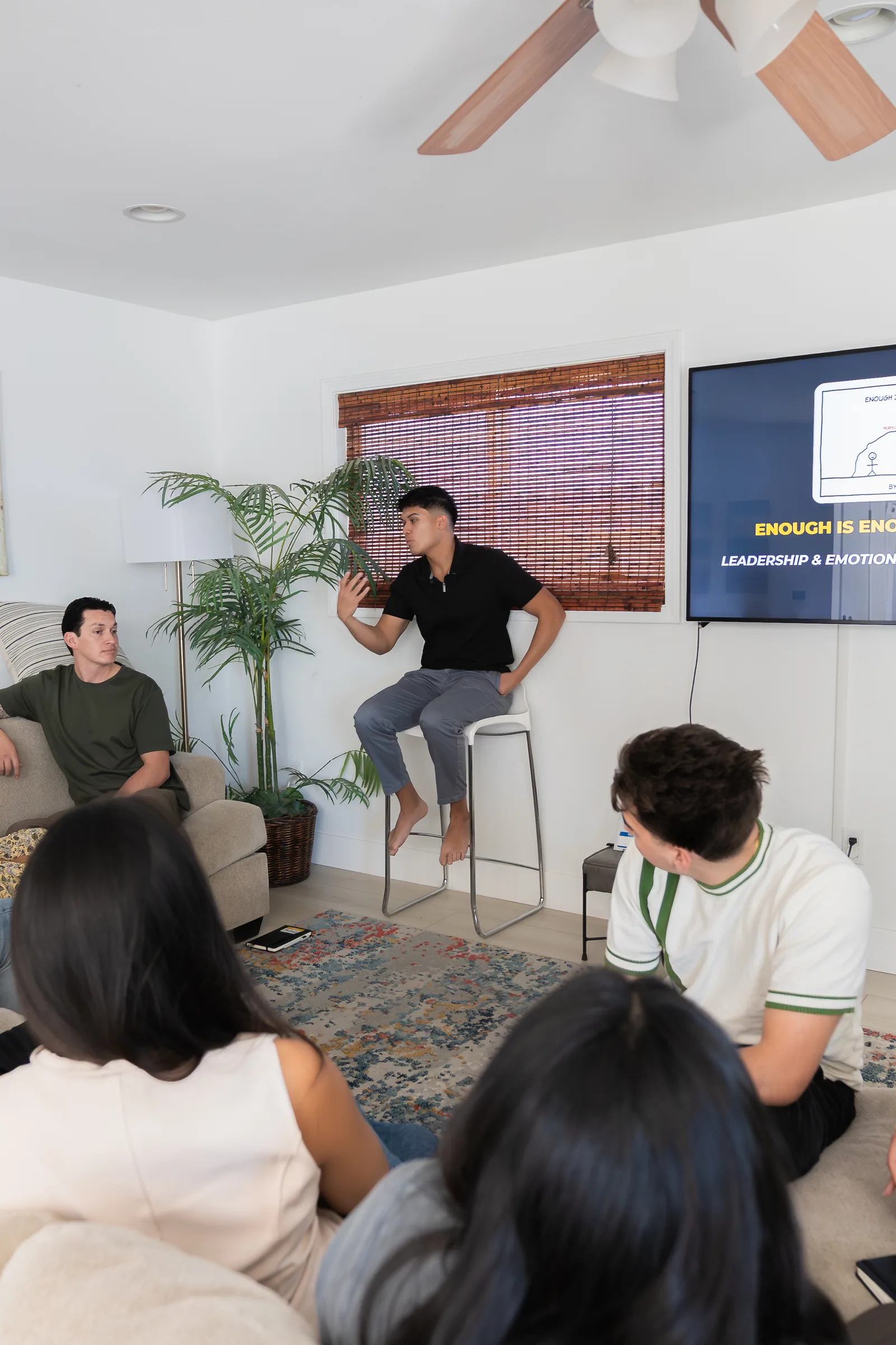 Eliam teaching a seated group at the MCU Storyteller's Mastermind